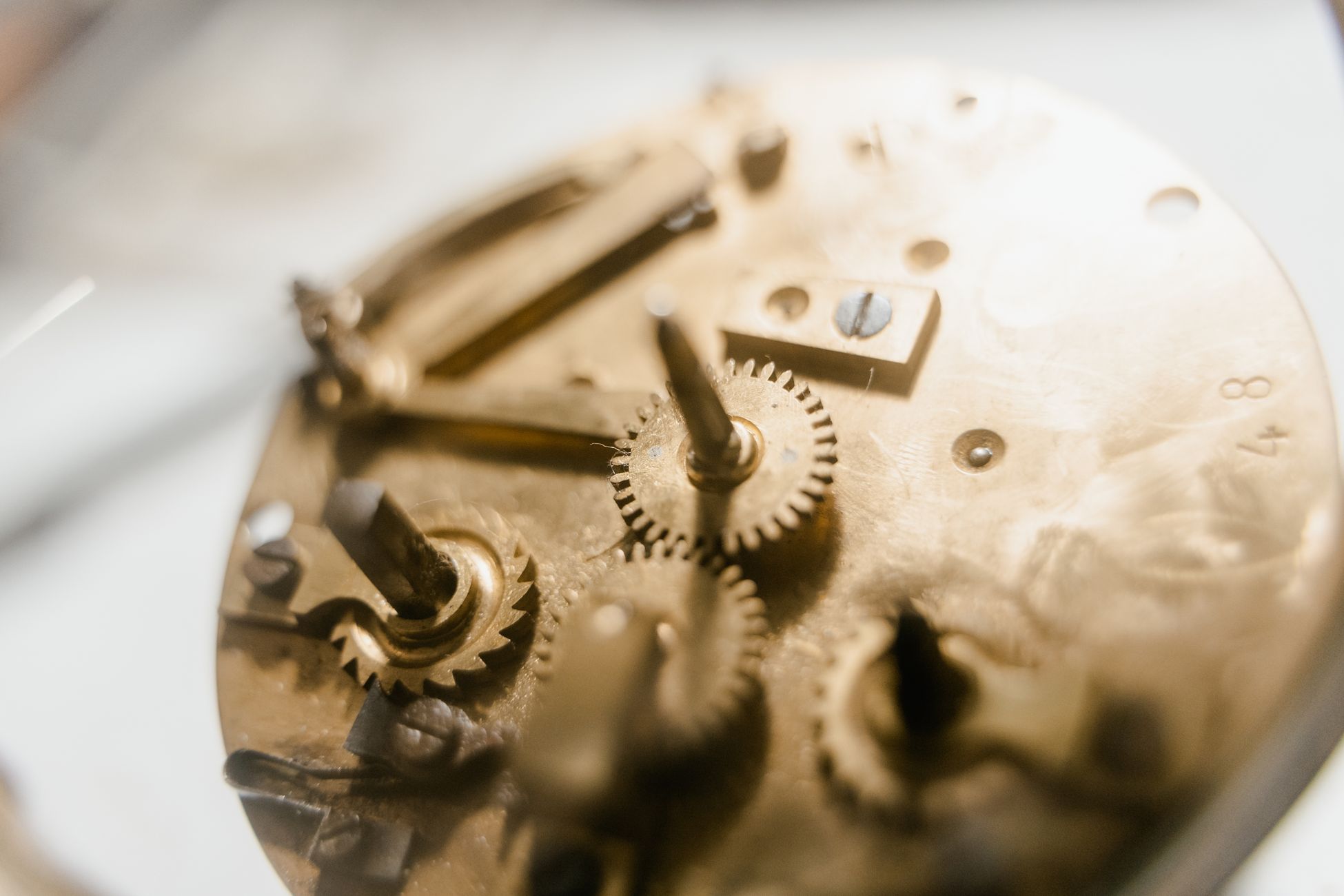 Antique clock gears during repair